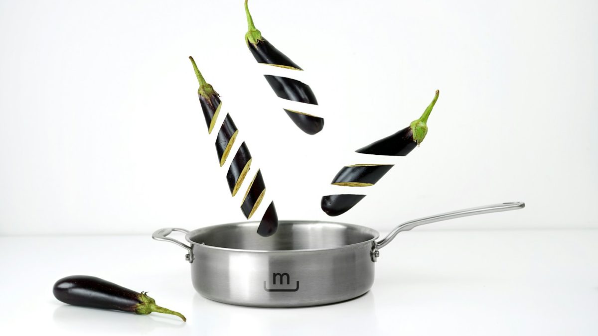 sliced eggplant on grey pan