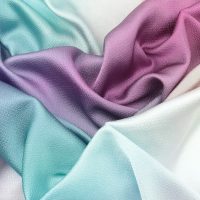 blue textile on white textile